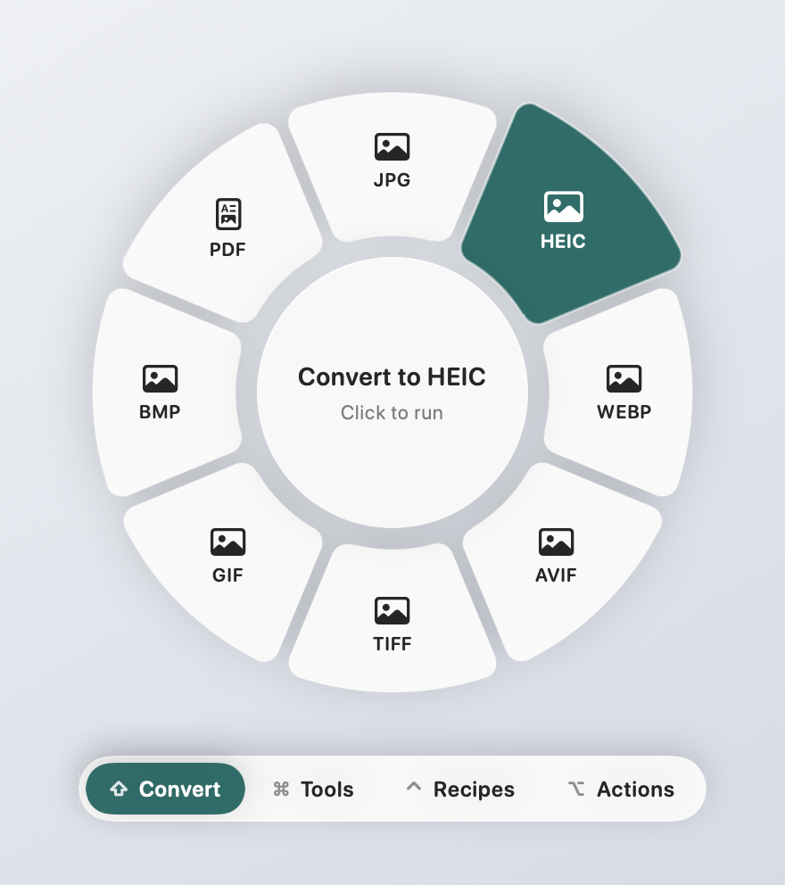 The Convert wheel open over a file, with HEIC highlighted and the wheel bar showing each wheel's key